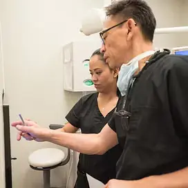 dr cheng with dental tech